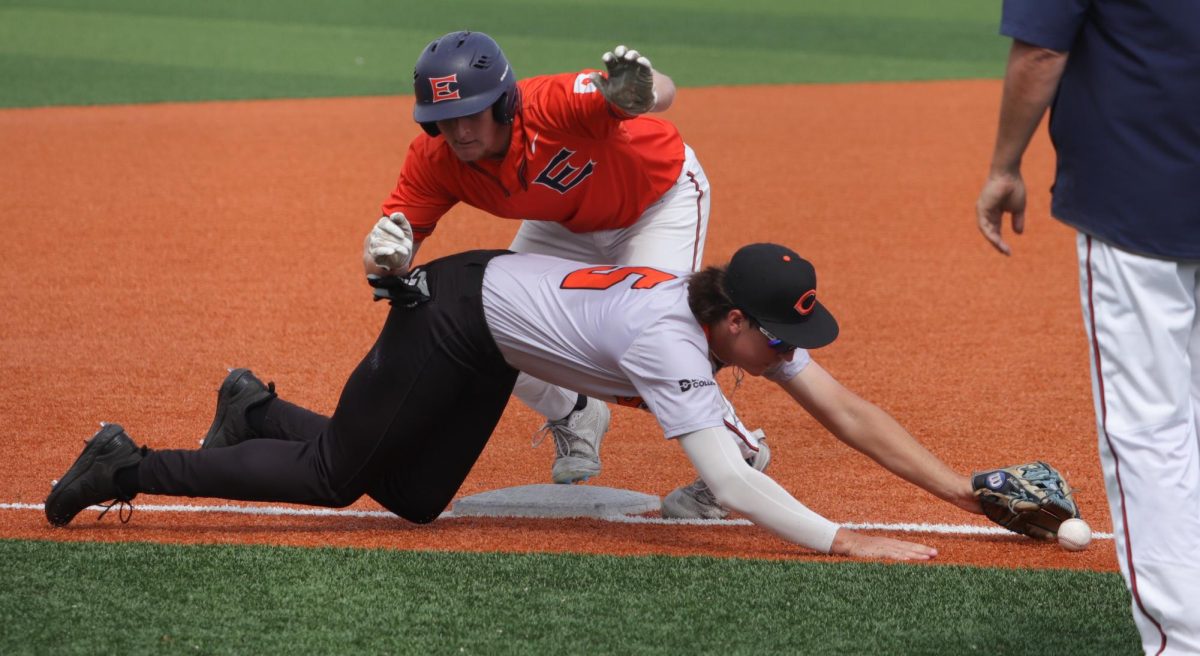John Jackson stumbles over the Suns' third basemen.